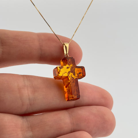 Pendentif croix en ambre et or AU750