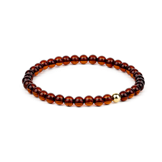 Amber bracelet with 18K solid gold bead